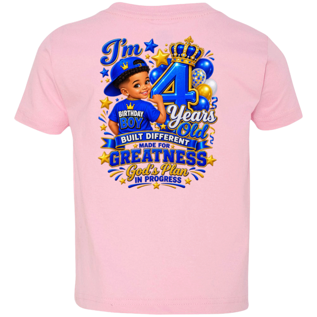A light pink short-sleeve t-shirt shown from the back, featuring a large graphic print for a 4th birthday. The graphic includes a cartoon boy in a blue cap, balloons, stars, and text reading 'I'm BIRTHDAY BOY 4 Years Old BUILT DIFFERENT MADE FOR GREATNESS God's Plan IN PROGRESS'.