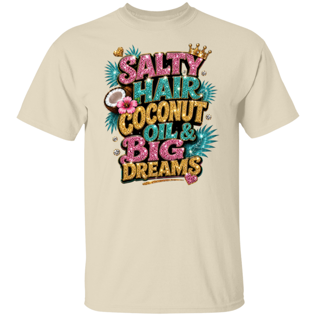 A natural crewneck t-shirt featuring a colorful graphic print on the front with the text 'SALTY HAIR COCONUT OIL & BIG DREAMS' in pink, teal, and gold glitter-style lettering, decorated with a crown, palm leaves, and a coconut.
