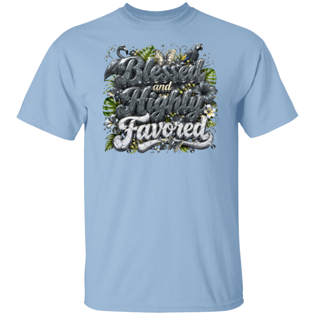 A light blue short-sleeve crewneck t-shirt featuring a large graphic print on the chest with the words 'Blessed and Highly Favored' in stylized lettering, decorated with butterflies, flowers, and green leaves and small birds.