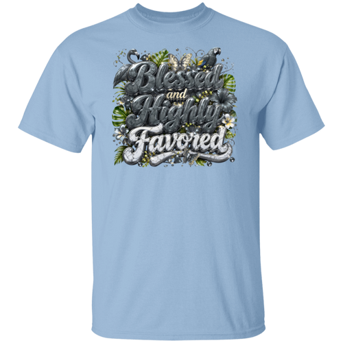 A light blue short-sleeve crewneck t-shirt featuring a large graphic print on the chest with the words 'Blessed and Highly Favored' in stylized lettering, decorated with butterflies, flowers, and green leaves and small birds.