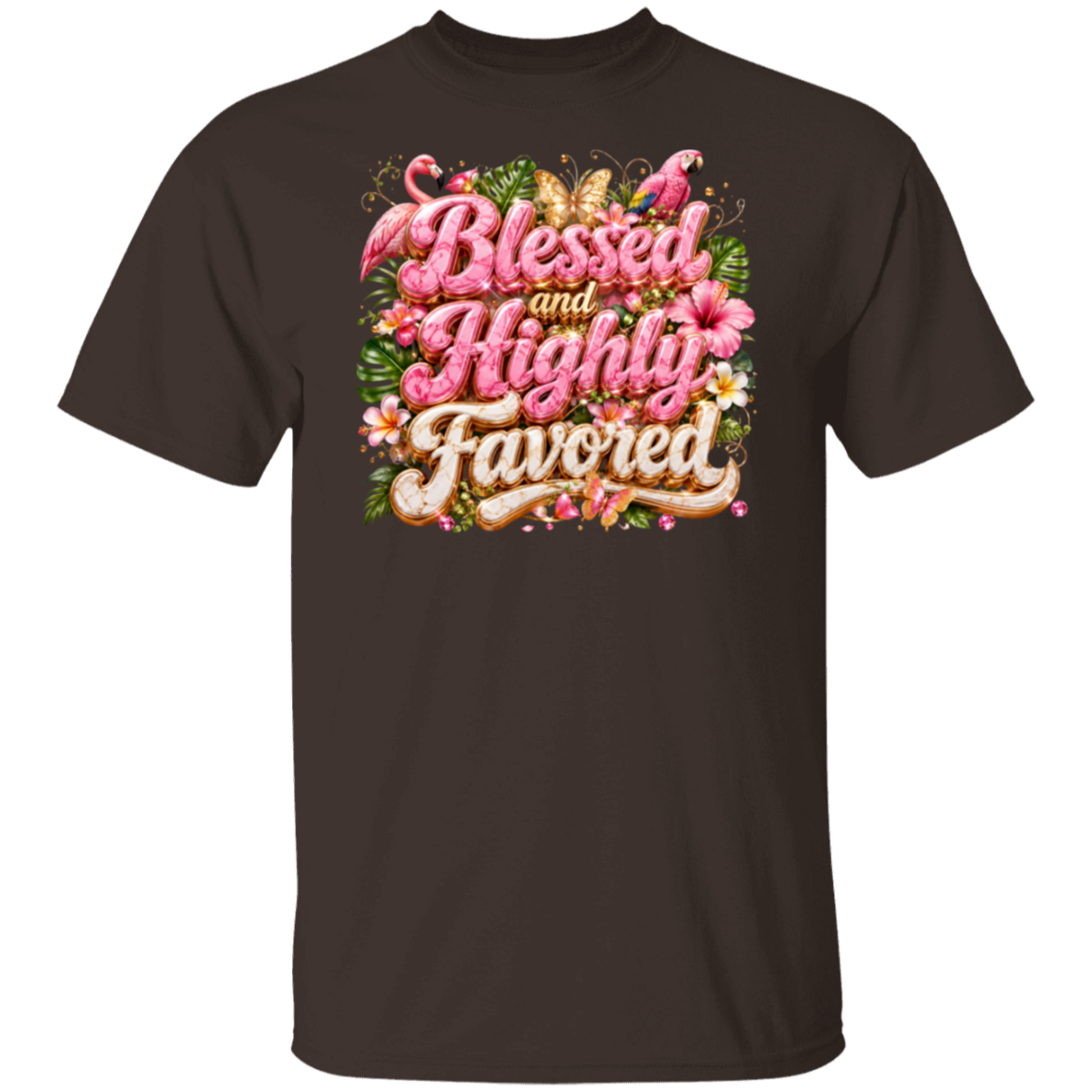 A dark chocolate short-sleeve crewneck t-shirt featuring a colorful graphic on the chest with the text 'Blessed and Highly Favored' in pink and gold script, decorated with tropical flowers, butterflies, and flamingos, shown against a plain white background.