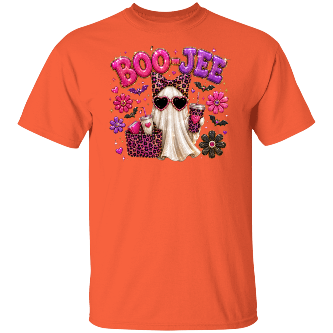 An orange short-sleeve crewneck t-shirt featuring a colorful graphic on the chest with the text 'BOO-JEE' in pink and purple balloons, a white ghost, a leopard-print bucket, and Halloween-themed illustrations.