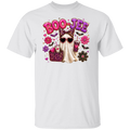 A white short-sleeve crewneck t-shirt featuring a colorful graphic print on the front. The graphic displays the text 'BOO-JEE' in pink and purple bubble letters, surrounded by a cute cartoon ghost wearing leopard-print sunglasses and a matching leopard-print top, with pink drinks, flowers, and bats.