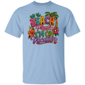 A light blue crewneck t-shirt featuring a colorful, glittery graphic that reads 'BEACH Please I'M ON Vacation' with palm trees, flowers, and sunglasses.