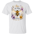 A white short-sleeve crewneck t-shirt featuring a colorful graphic print of a honeybee surrounded by purple flowers and the text 'Bee KIND Bee Happy Bee YOURSELF YOU ARE ENOUGH'.