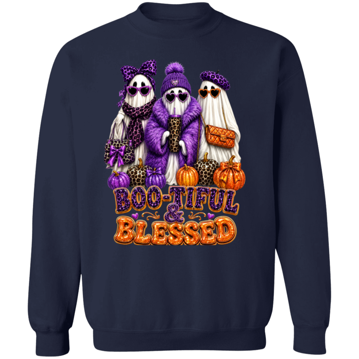 A navy blue crewneck sweatshirt featuring a colorful graphic of three ghosts in purple and leopard-print costumes with pumpkins and the text 'BOO-TIFUL & BLESSED' in orange and purple.