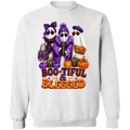 A white crewneck sweatshirt featuring a colorful Halloween graphic of three ghosts dressed in purple and black, standing next to orange pumpkins with the text 'BOO-TIFUL & BLESSED' in purple and orange.