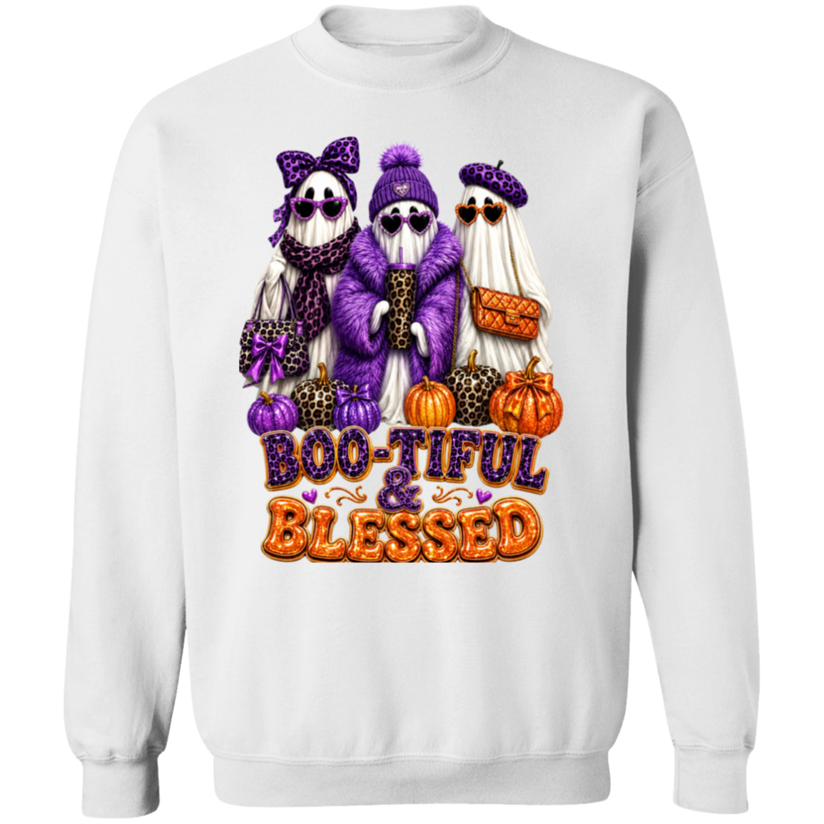 A white crewneck sweatshirt featuring a colorful Halloween graphic of three ghosts dressed in purple and black, standing next to orange pumpkins with the text 'BOO-TIFUL & BLESSED' in purple and orange.