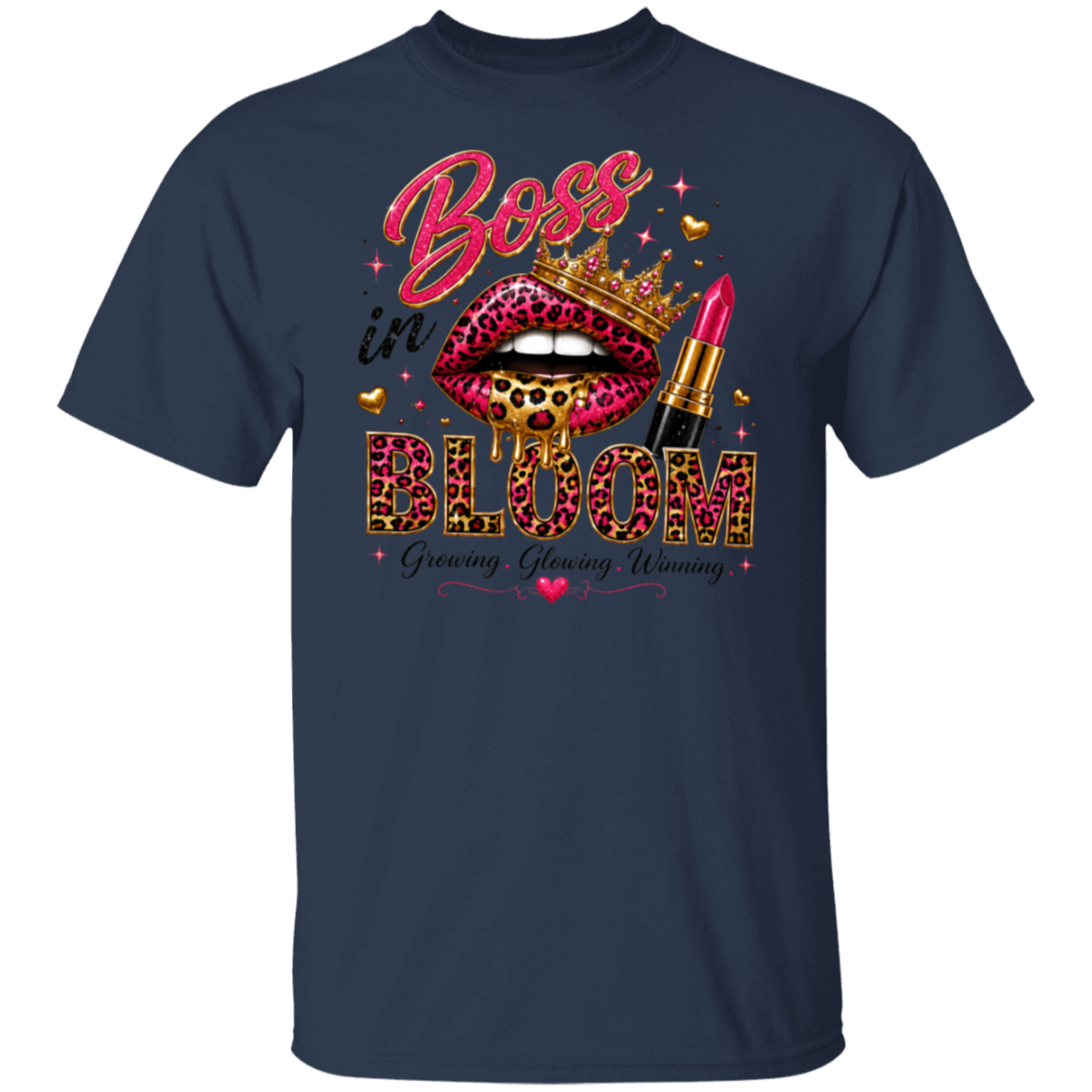 A navy blue short-sleeve t-shirt with a colorful graphic on the front featuring the text 'Boss in BLOOM' in leopard print and pink, along with a crown, lips, and lipstick.