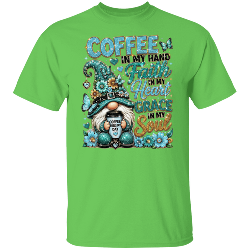 A lime short-sleeve crewneck t-shirt featuring a colorful graphic print on the front. The graphic displays a gnome holding a coffee mug surrounded by flowers and butterflies, with the text 'COFFEE IN MY HAND', 'Faith IN MY Heart', 'GRACE IN MY Soul', and 'COFFEE IS MY DAY'.