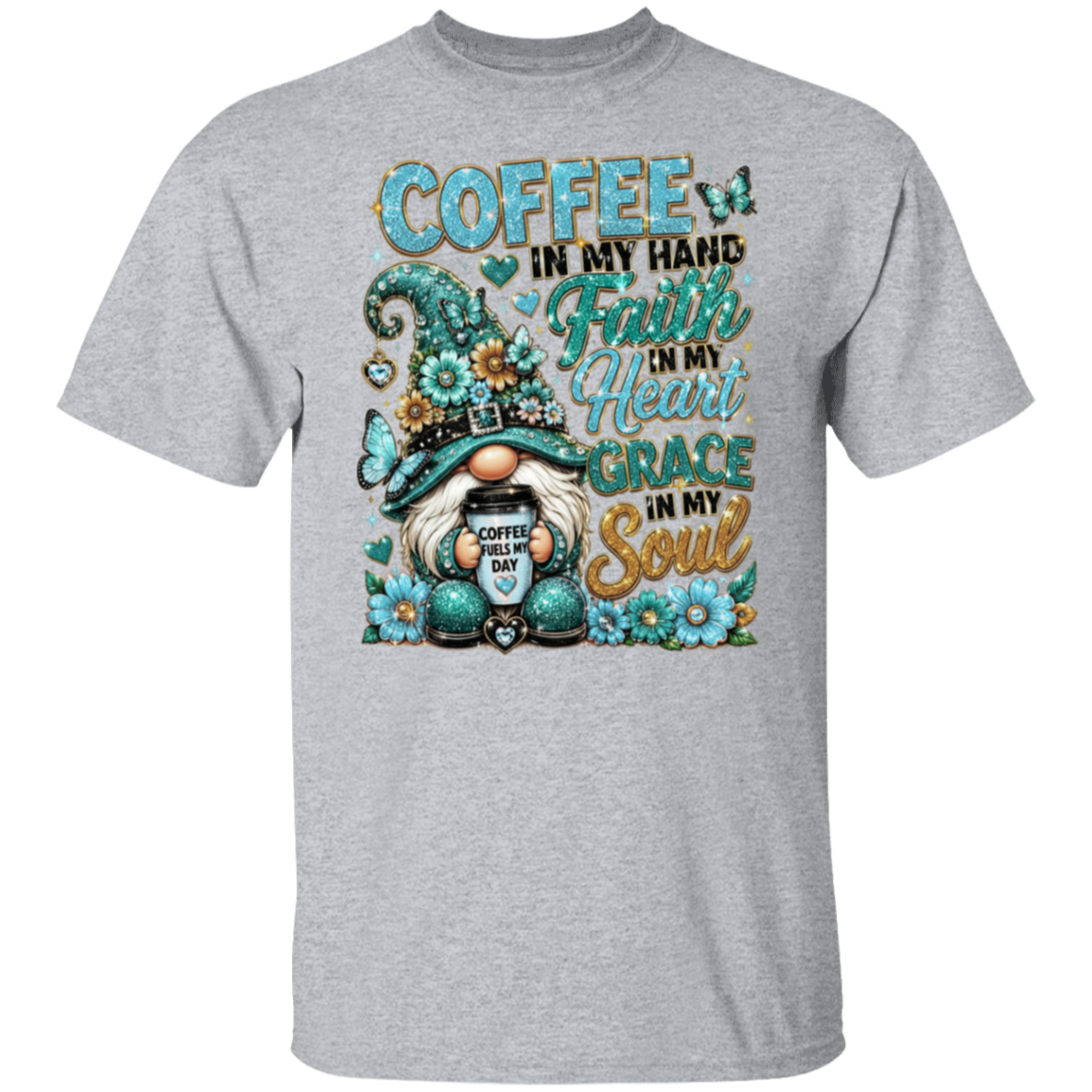 A heather sport gray short-sleeve crewneck t-shirt featuring a colorful graphic print of a gnome, flowers, and butterflies with the text 'COFFEE IN MY HAND Faith IN My Heart GRACE IN My Soul'.