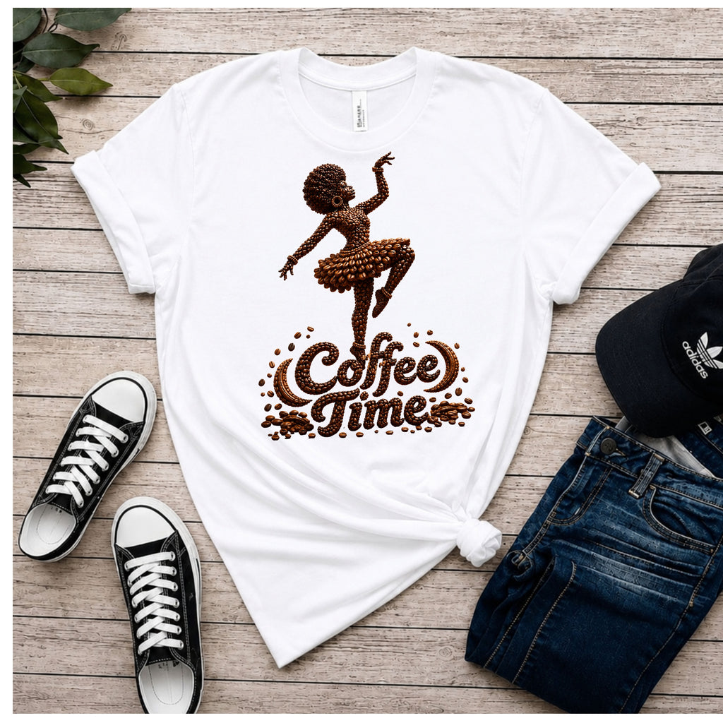 A white graphic T-shirt laid flat on a rustic wood surface, styled with black sneakers, blue jeans, and a black Adidas cap. The shirt has a brown graphic of a dancing figure and the words 'Coffee Time'.
