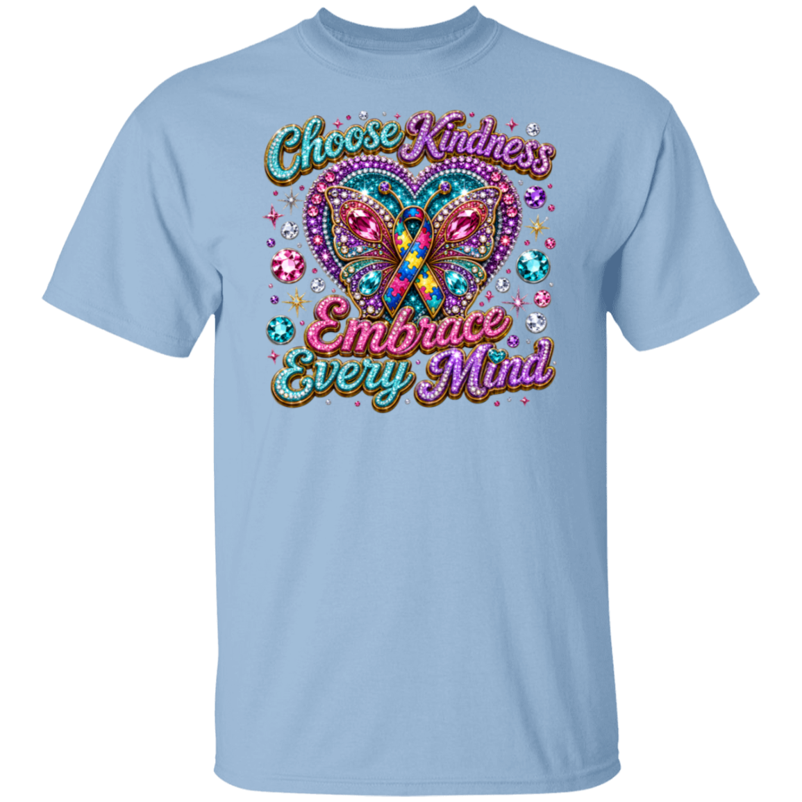 A light blue short-sleeve crewneck t-shirt featuring a colorful graphic on the front. The graphic displays a glittery butterfly with a teal and orange awareness ribbon inside its wings, surrounded by sparkling gem details and the text 'Choose Kindness Embrace Every Mind' in a stylized, multi-colored font.
