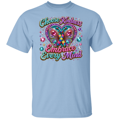 A light blue short-sleeve crewneck t-shirt featuring a colorful graphic on the front. The graphic displays a glittery butterfly with a teal and orange awareness ribbon inside its wings, surrounded by sparkling gem details and the text 'Choose Kindness Embrace Every Mind' in a stylized, multi-colored font.