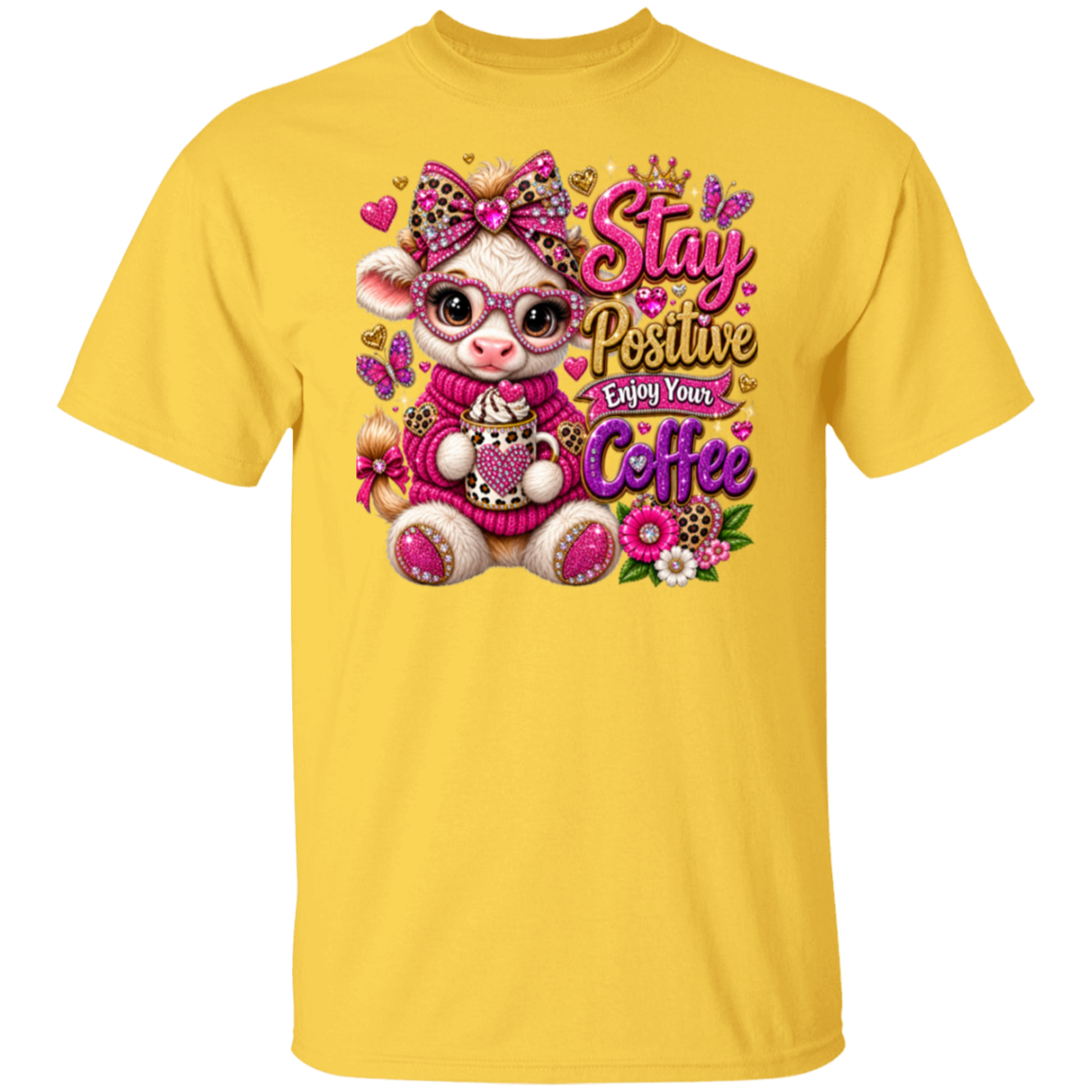 A daisy color short-sleeve crewneck t-shirt featuring a colorful graphic of a cute cartoon cow wearing pink glasses and a pink sweater, surrounded by flowers and the text 'Stay Positive Enjoy Your Coffee'.