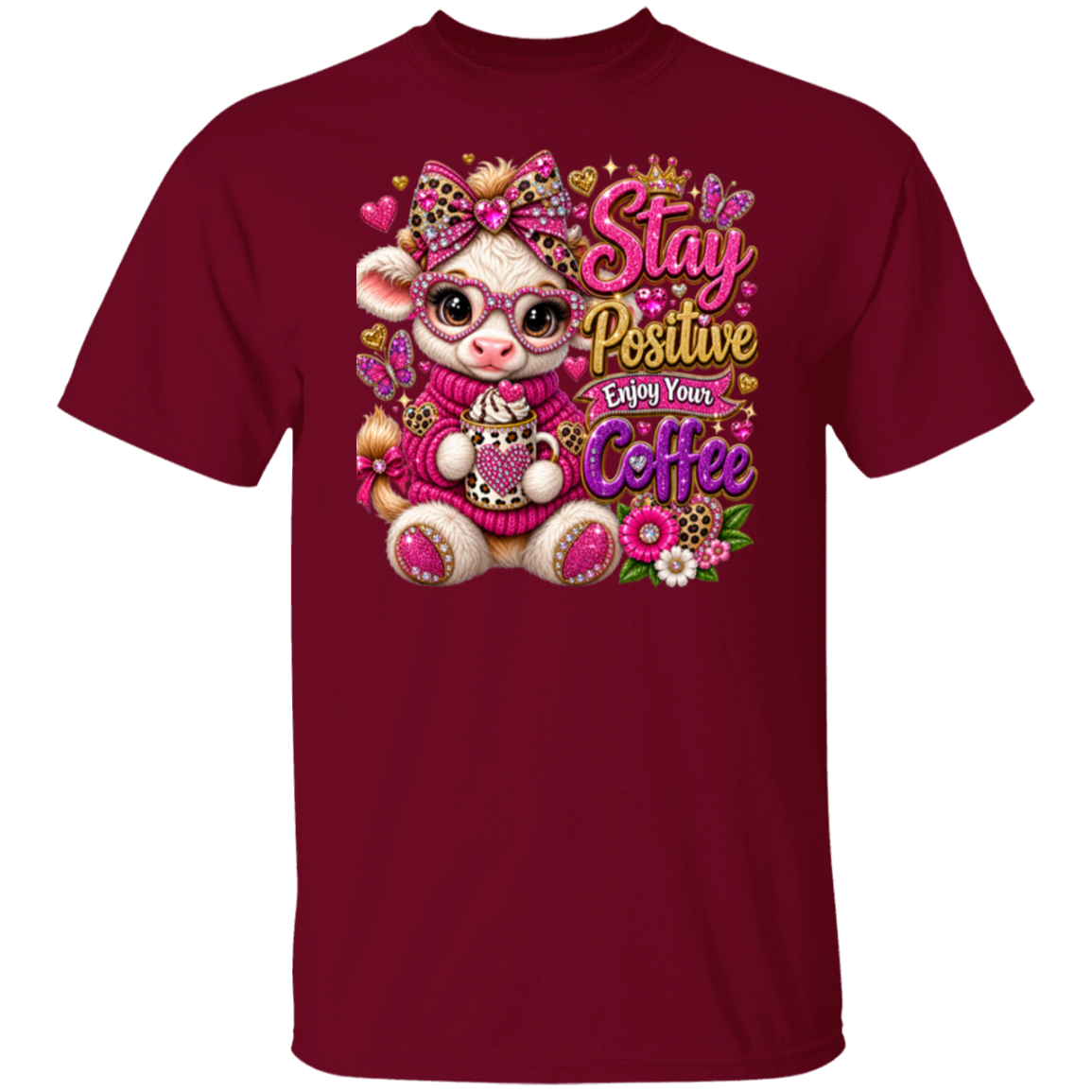 A garnet short-sleeve crewneck t-shirt featuring a colorful graphic print of a cute cartoon llama wearing pink glasses and a pink sweater, surrounded by flowers and the text 'Stay Positive Enjoy Your Coffee'.