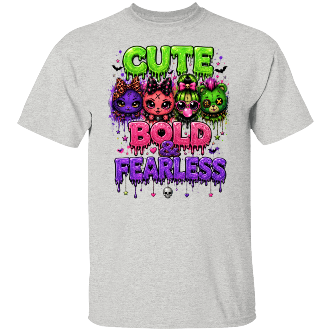 A ash short-sleeve t-shirt with a colorful graphic print on the front. The graphic features the text 'CUTE BOLD & FEARLESS' in dripping neon green, pink, and purple fonts, with five cute cartoon cats in purple, pink, green, and orange in the center.