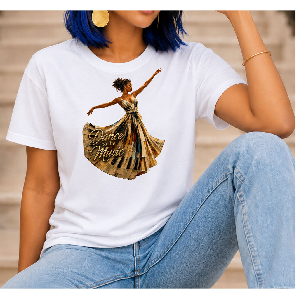 A woman wearing a white short-sleeve graphic T-shirt with a printed illustration of a dancing figure and the words 'Dance with the Music,' paired with light blue jeans, seated against a softly blurred indoor background.