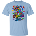 A light blue short-sleeve crewneck t-shirt featuring a colorful graphic on the chest. The graphic displays a large letter 'A' filled with a rainbow puzzle-piece pattern and a matching bow, surrounded by puzzle pieces and hearts, with the text 'Different not Less' written below in a rainbow gradient.