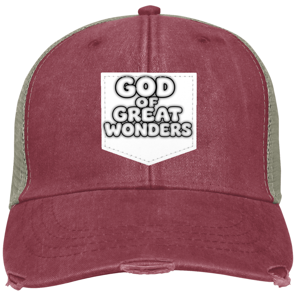 A distressed trucker-style baseball cap with a washed maroon front and brim, sage green mesh side panels, and a white shield-shaped patch on the front that reads 'GOD OF GREAT WONDERS' in black outlined lettering.