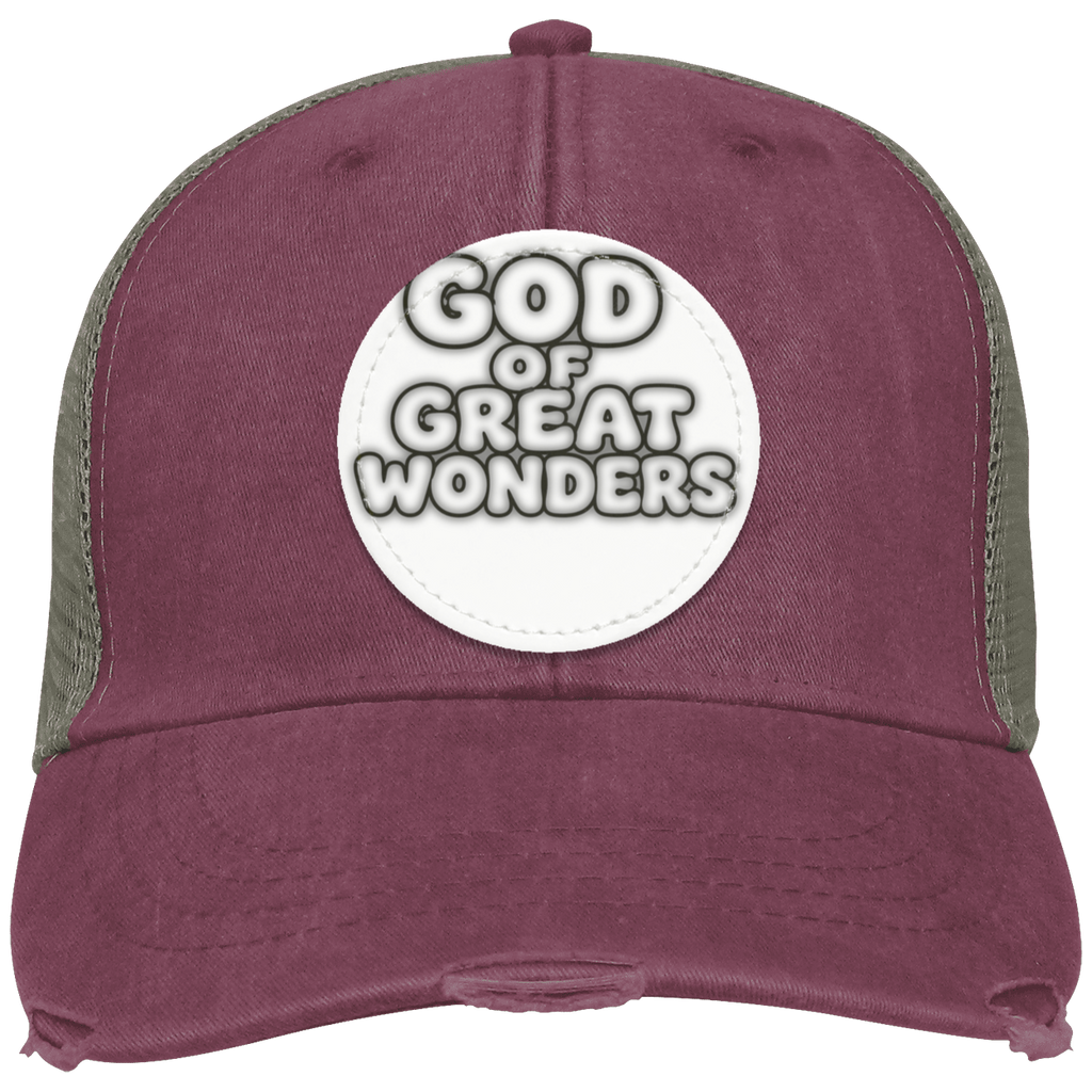A distressed trucker hat in washed maroon with olive green mesh side panels and a white circular patch on the front that reads 'GOD OF GREAT WONDERS'.