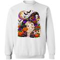 A white crewneck sweatshirt featuring a large, colorful graphic of a Halloween gnome with a tall witch hat, surrounded by pumpkins, roses, a crescent moon, and bats.
