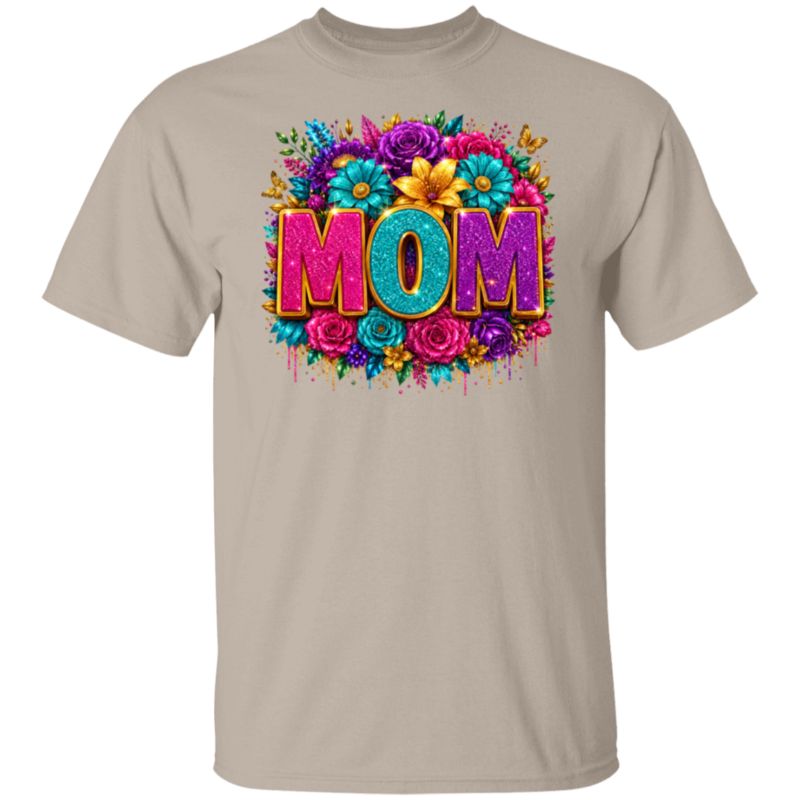 A sand color crewneck t-shirt featuring a colorful graphic print on the front with the word 'MOM' in 3D letters surrounded by vibrant flowers.