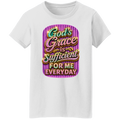 A white short-sleeve crewneck t-shirt featuring a colorful graphic print on the front. The graphic has a purple striped background and displays the text 'God's Grace is Sufficient FOR ME EVERYDAY' in stylized, glittery fonts.