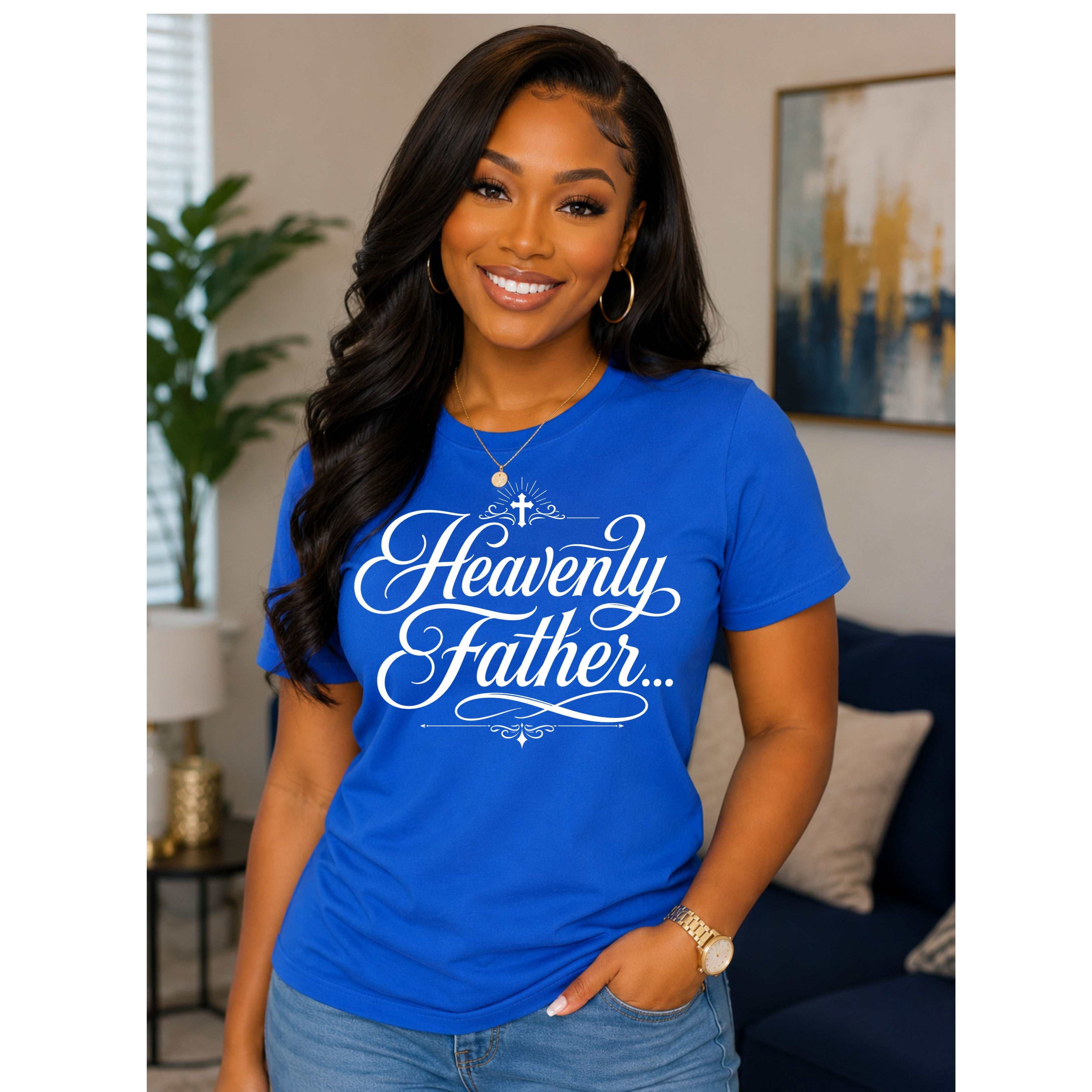 A woman wearing a bright blue short-sleeve t-shirt with 'Heavenly Father.
