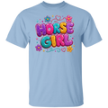 A light blue color short-sleeve crewneck t-shirt featuring a colorful graphic print on the chest that reads 'HORSE GIRL' in bubbly, glitter-textured letters with flowers and hearts.