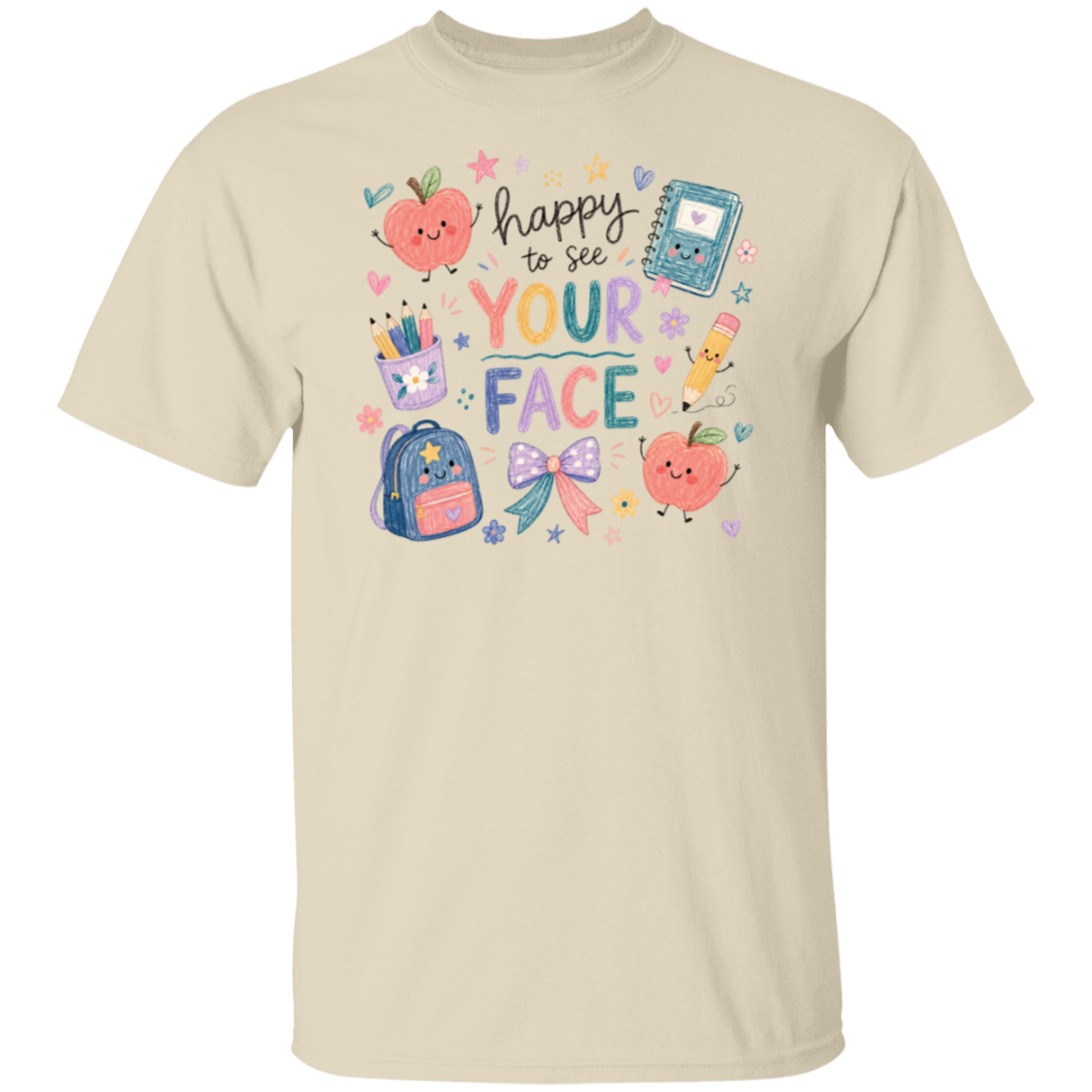 A natural color crewneck t-shirt featuring a colorful graphic print on the front with cute school-themed illustrations and the text 'happy to see YOUR FACE'.