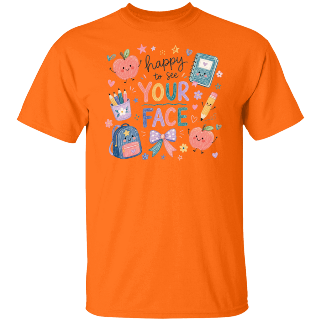 A safety orange short-sleeve crewneck t-shirt featuring a colorful school-themed graphic on the chest with the text 'happy to see YOUR FACE' surrounded by cute cartoon illustrations of an apple, notebook, pencil, backpack, and bow.