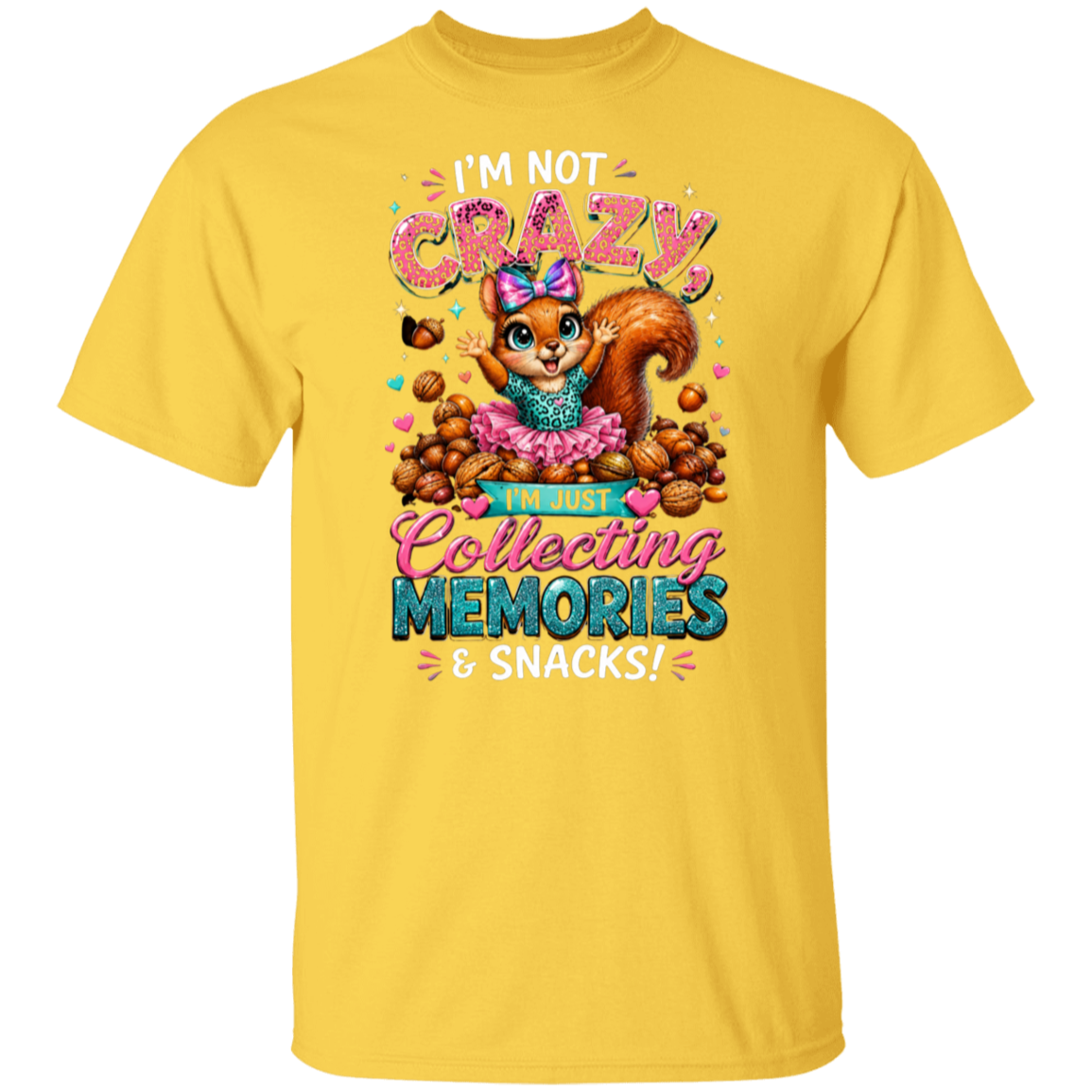 A daisy short-sleeve crewneck t-shirt featuring a colorful graphic of a cartoon squirrel surrounded by nuts and candy, with the text 'I'M NOT CRAZY I'M JUST Collecting MEMORIES & SNACKS!'.