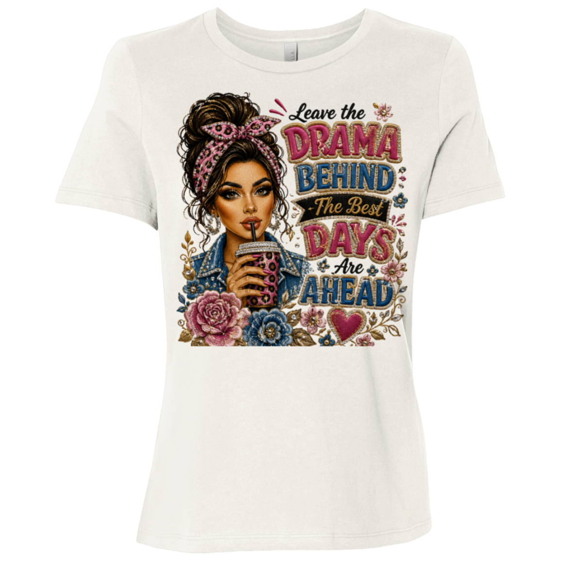 A vintage white color short-sleeve t-shirt with a colorful graphic print on the front. The graphic features an illustration of a woman with her hair in a messy bun, holding a cup close to her mouth, surrounded by flowers and the text 'Leave the DRAMA BEHIND The Best DAYS Are AHEAD'.