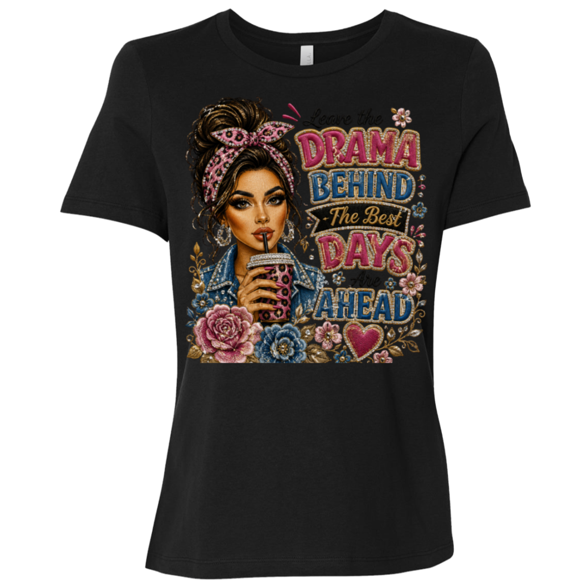 A black color short-sleeve t-shirt with a colorful graphic print on the front. The graphic features an illustration of a woman with a headband and flowers, holding a cup with straw, next to the text 'Leave the DRAMA BEHIND The Best DAYS Are AHEAD' in stylized fonts.