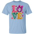 A light blue crewneck t-shirt featuring a large, colorful 'LOVE' graphic on the chest. The letters are filled with pink, purple, and teal sequins, outlined with gold rhinestones, and decorated with sequin bows and small heart details.