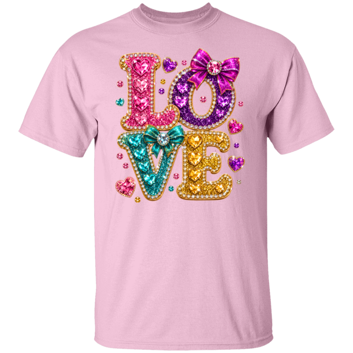 A light pink short-sleeve crewneck t-shirt featuring a large, colorful 'LOVE' graphic on the front. The letters are filled with glittery textures in pink, purple, teal, and gold, decorated with sequins, rhinestones, and bows, and surrounded by small heart graphics.