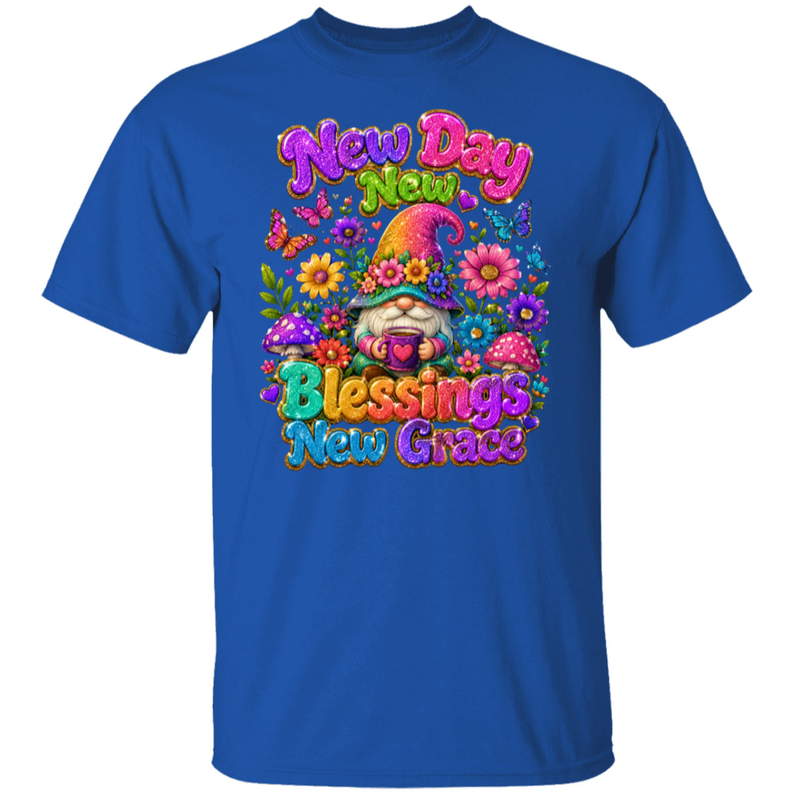 A royal blue short-sleeve crewneck t-shirt featuring a colorful graphic print on the front. The graphic displays a gnome surrounded by flowers and mushrooms, with the text 'New Day New Blessings New Grace' in a playful, multi-colored font.