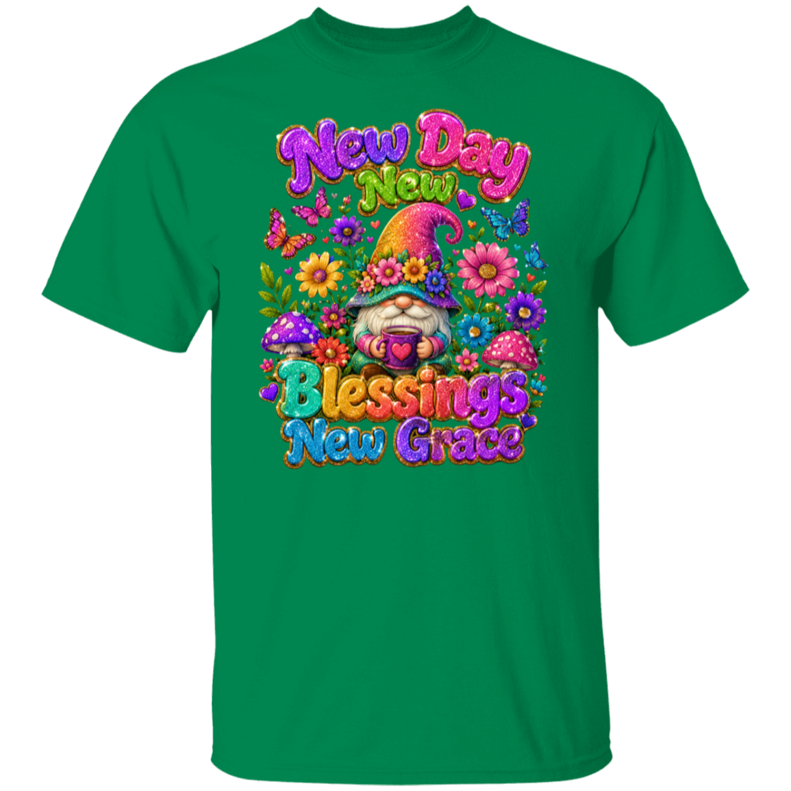 A turf green short-sleeve crewneck t-shirt featuring a colorful graphic print on the front. The graphic displays a gnome wearing a flower crown and mushroom hat, surrounded by vibrant flowers, with the text 'New Day New Blessings New Grace' in a playful, multicolored font.