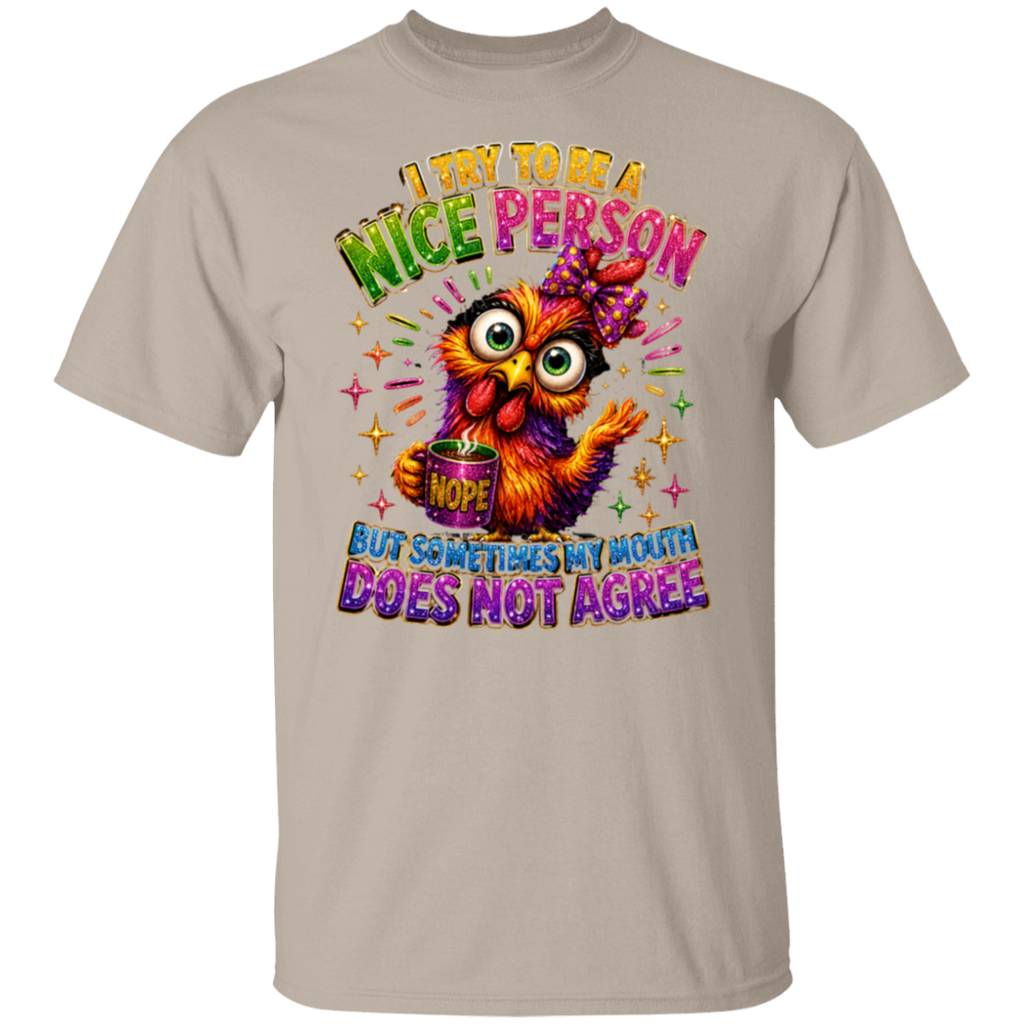 A sand crewneck t-shirt featuring a colorful graphic of a cartoon owl holding a mug that says 'NOPE' under the text 'I TRY TO BE A NICE PERSON BUT SOMETIMES MY MOUTH DOES NOT AGREE'.