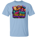 A light blue crewneck t-shirt featuring a colorful graphic print on the front. The graphic depicts a fluffy brown highland cow wearing a sleep mask that says 'I AM NOT A ZOMBIE' and a top hat reading 'MAD ALON SO DON'T WORRY'.