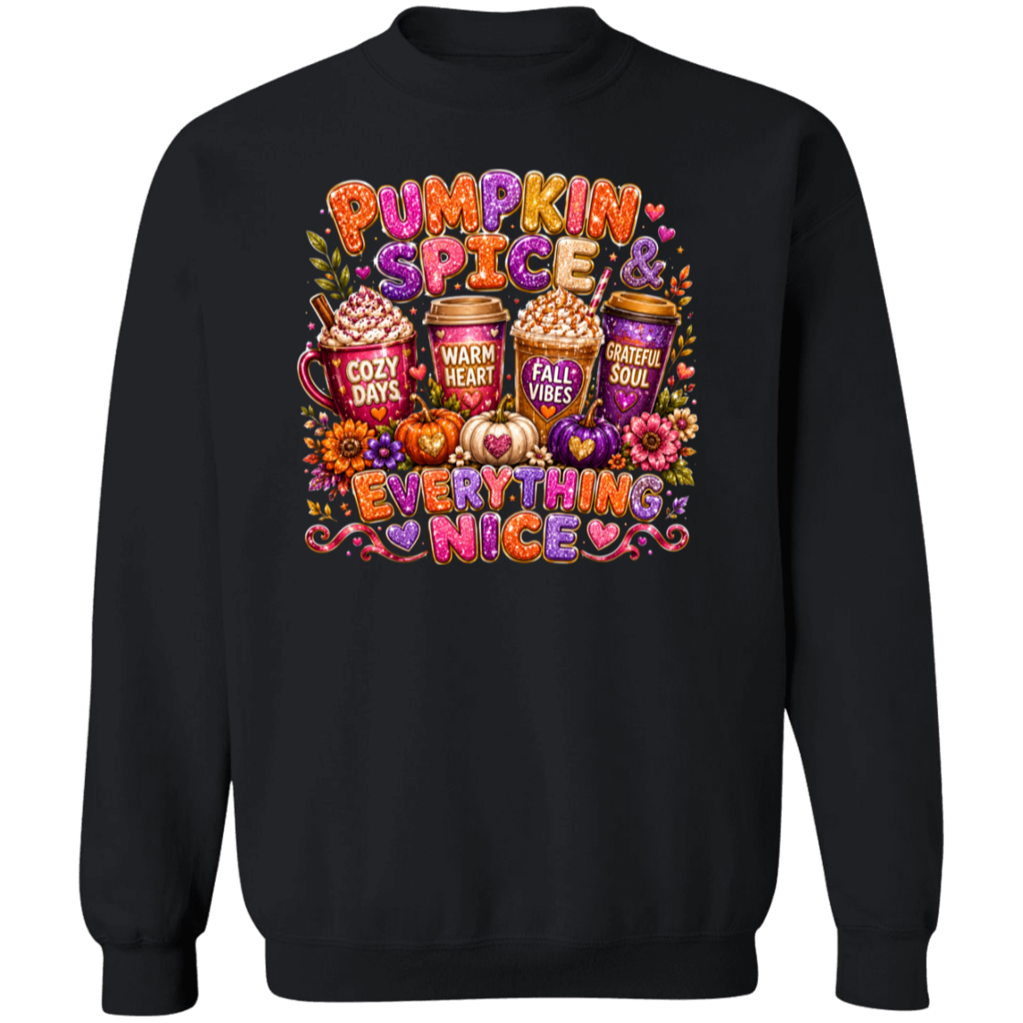 A black crewneck sweatshirt featuring a colorful graphic print on the front with the text 'Pumpkin Spice & Everything Nice' and illustrations of hot cocoa cups, pumpkins, hearts, and fall flowers.