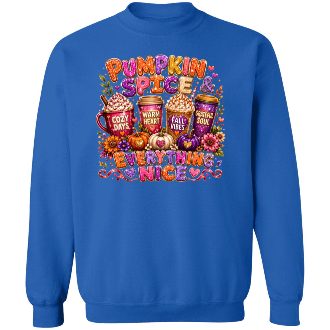 A royal blue crewneck sweatshirt featuring a colorful 'Pumpkin Spice & Everything Nice' graphic print on the front, displayed against a solid white background.