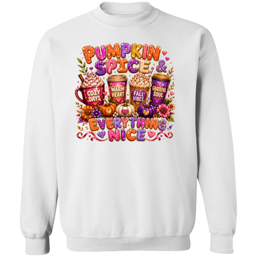 A white crewneck sweatshirt featuring a colorful autumn-themed graphic print on the front with the text 'Pumpkin Spice & Everything Nice' and illustrations of hot cocoa mugs, pumpkins, and fall leaves.