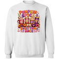 A white crewneck sweatshirt featuring a colorful autumn-themed graphic print on the front with the text 'Pumpkin Spice & Everything Nice' and illustrations of hot cocoa mugs, pumpkins, and fall leaves.