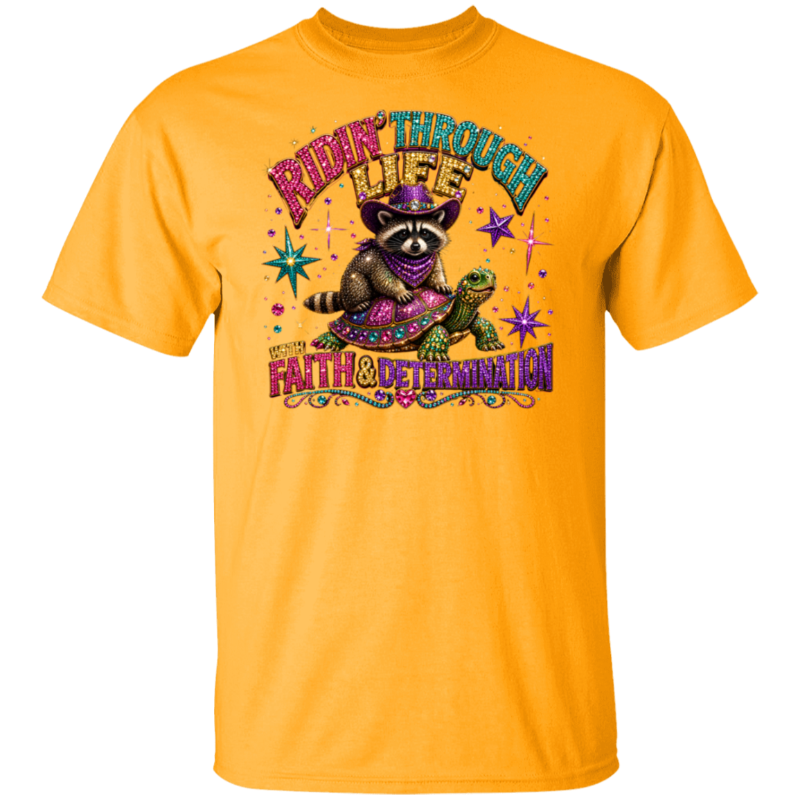 A gold color short-sleeve crewneck t-shirt featuring a colorful graphic of a raccoon in a purple hat and scarf riding a turtle, with the text 'EAT HER THROUGH WIFE' and 'FAT HUNTER & DETERMINATION'.