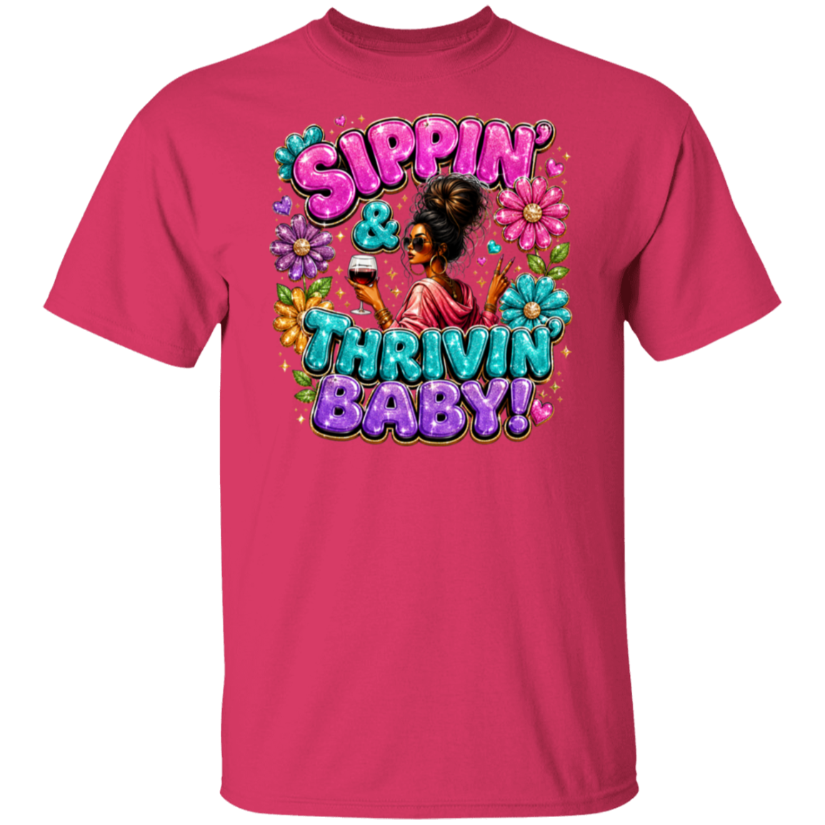 An heliconia color short-sleeve crewneck t-shirt featuring a colorful retro graphic on the front with the text 'Sippin' & Thrivin' Baby!' and an illustration of a woman holding a wine glass surrounded by flowers.