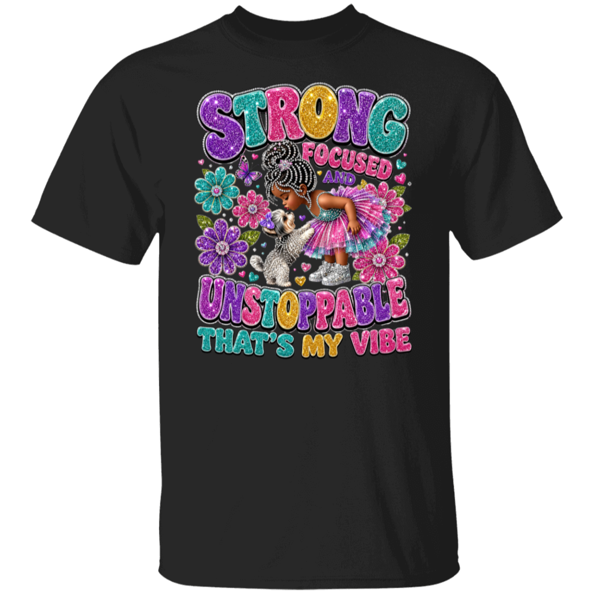 A black color short-sleeve crewneck t-shirt featuring a colorful graphic print on the front. The graphic displays a cartoon illustration of a young girl with braided hair in a pink dress, surrounded by flowers, with the text 'STRONG FOCUSED UNSTOPPABLE THAT'S MY VIBE' in a vibrant, multicolored bubbly font.