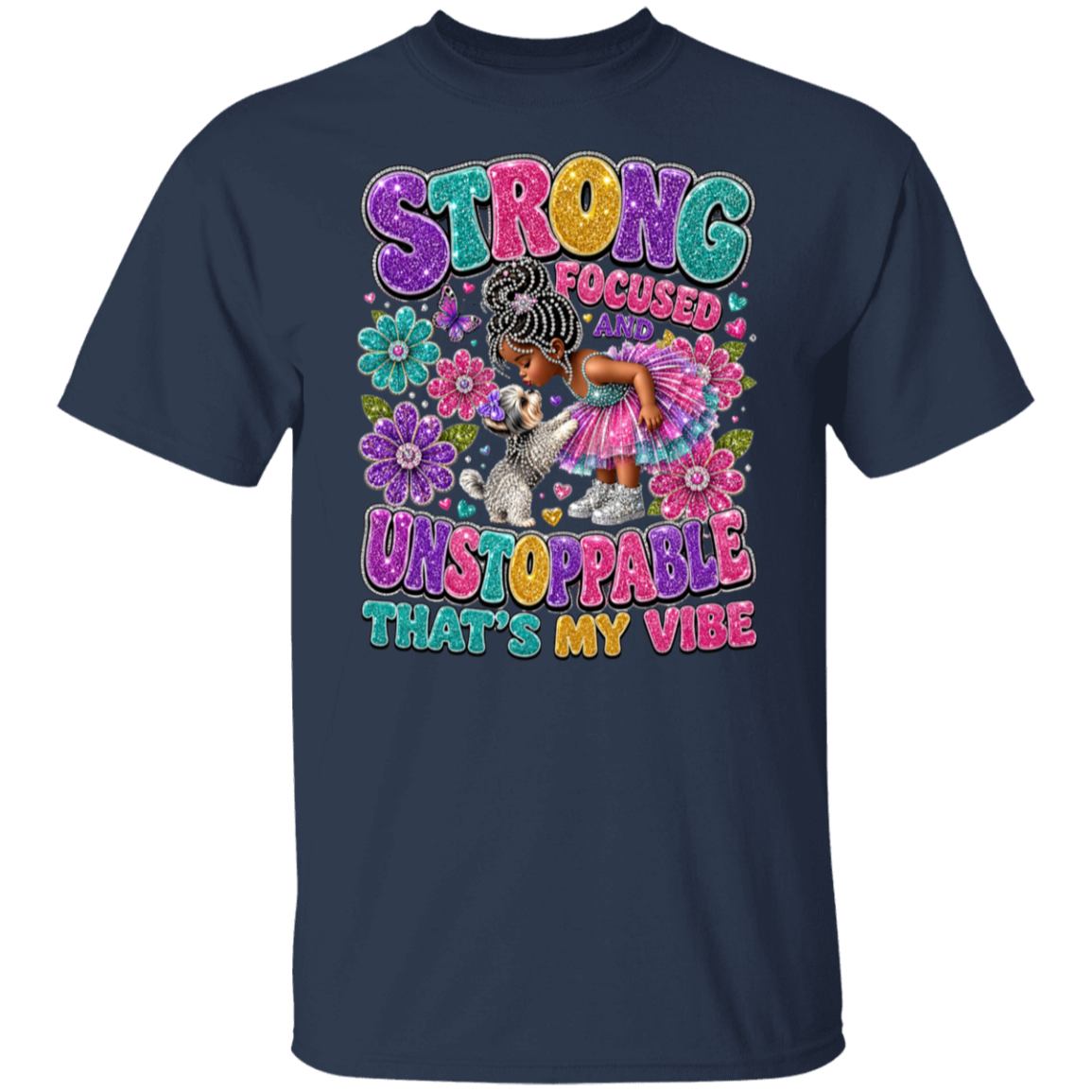 A navy blue short-sleeve t-shirt with a colorful graphic on the front. The graphic features the text 'STRONG FOCUSED UNSTOPPABLE THAT'S MY VIBE' in a playful, multi-colored font, surrounded by flowers and an illustration of a young girl hugging a small dog.