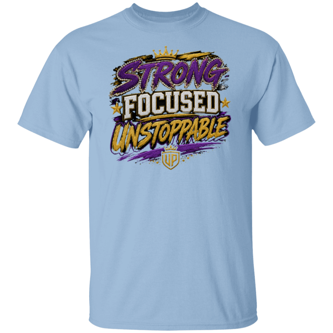 A light blue crewneck t-shirt featuring a colorful graphic on the chest with the words 'STRONG FOCUSED UNSTOPPABLE' in stylized purple, white, and yellow lettering, along with a small gold crest below.
